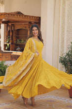 Pastel 5 layer gowns with sequinned dupatta in yellow