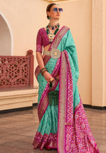 Sea green silk bandhej print saree