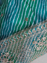 Blue and green Leheriya print organza lehenga