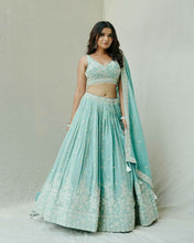 Roman silk pastel green Lehenga