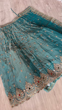 Blue and gold zari silk lehenga