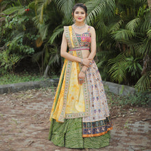 Traditional green bandhani and Patola chaniya choli - readymade