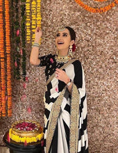 Superhit black and white saree is back!