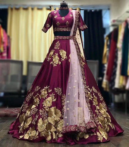 Purple satin and gold lehenga