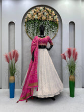 White and pink bandhani lehenga