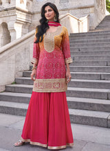 Pink and yellow bandhani print flared pants suit
