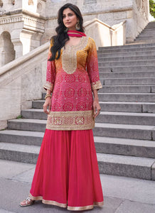 Pink and yellow bandhani print flared pants suit