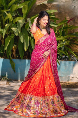 Orange jacquard silk and pink bandhani Lehenga