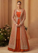 Orange silk gown with jacket and belt
