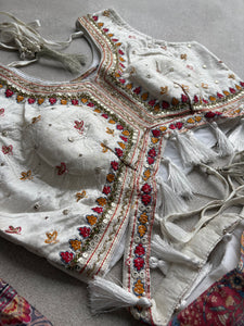 Elegant white embroidered Chaniya Choli with colourful dupatta