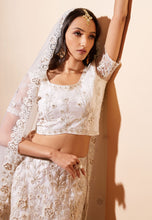 Oreya vol 2 - off white net Lehenga