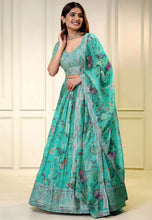 Sea green organza bird and floral print Lehenga