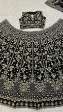 Black and gold embroidered lehenga