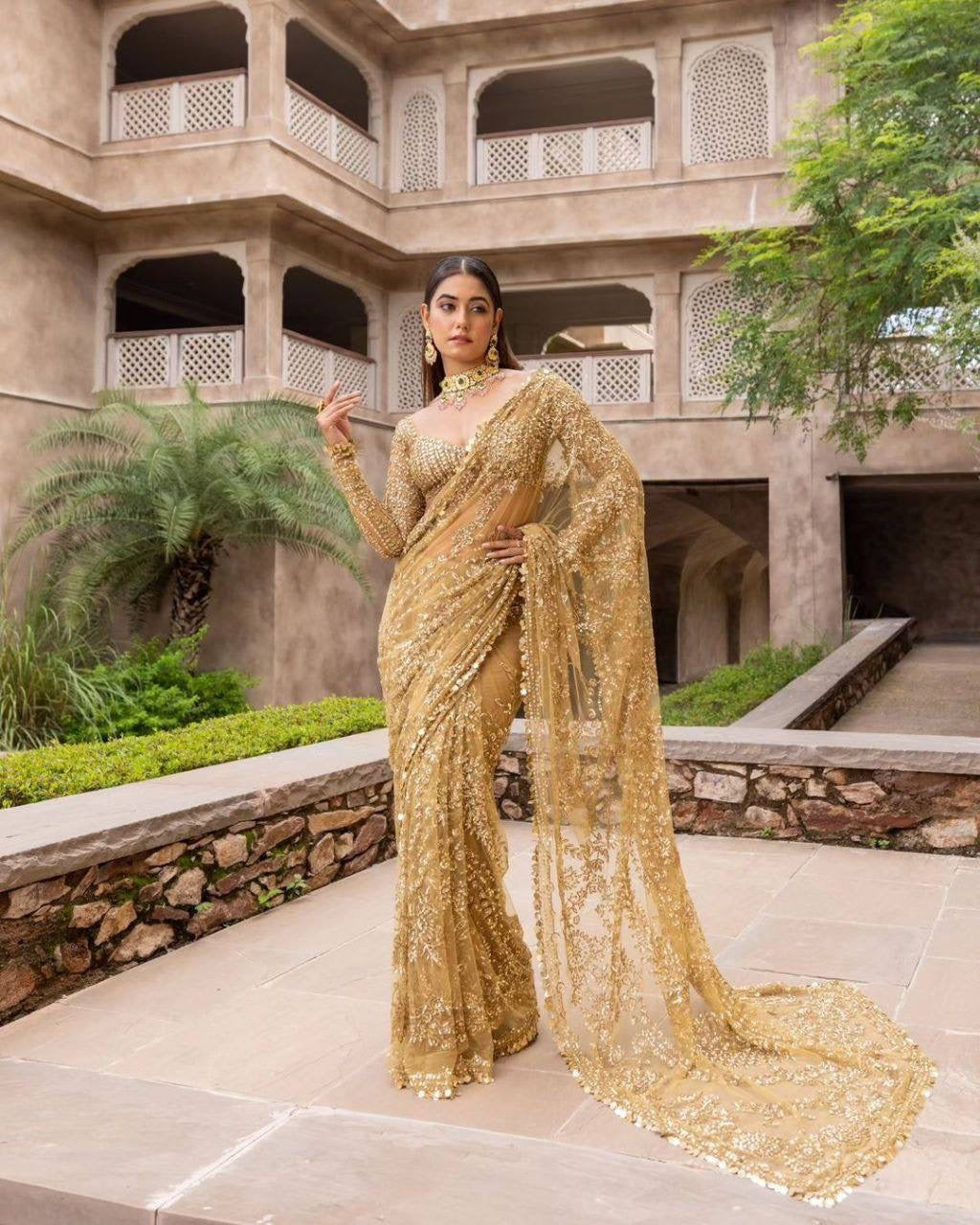 Partywear gold net saree