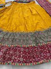 Readymade yellow mirror work chaniya choli - flared and 2 blouses