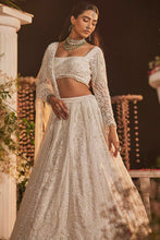 White soft net sequinned Lehenga