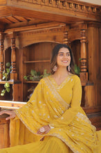 Pastel 5 layer gowns with sequinned dupatta in yellow