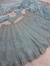Icy blue Rangoli silk lehenga (pastel)