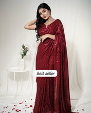 Red sequinned saree