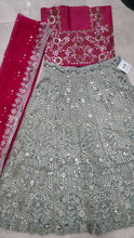 Exquisite diamond silk sage green Lehenga with contrasting colours