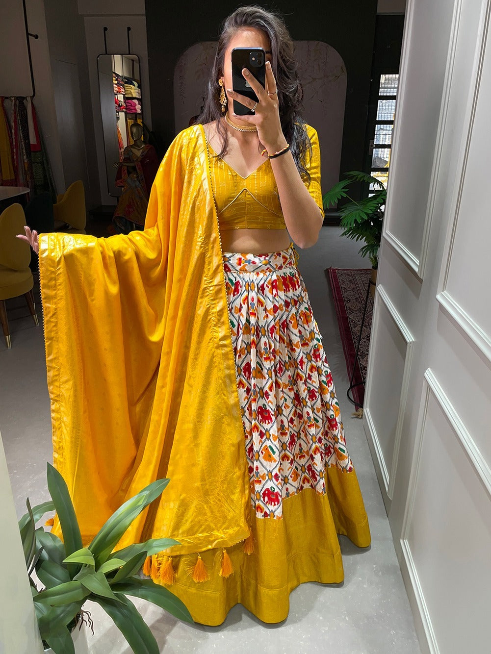 Mustard Dola silk and patola print Lehengas