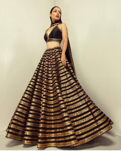 Sabyasachi inspired black and gold Lehenga