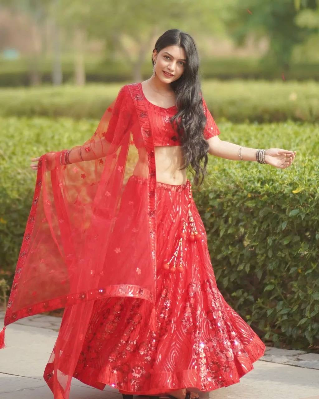 Red sequins net Lehenga