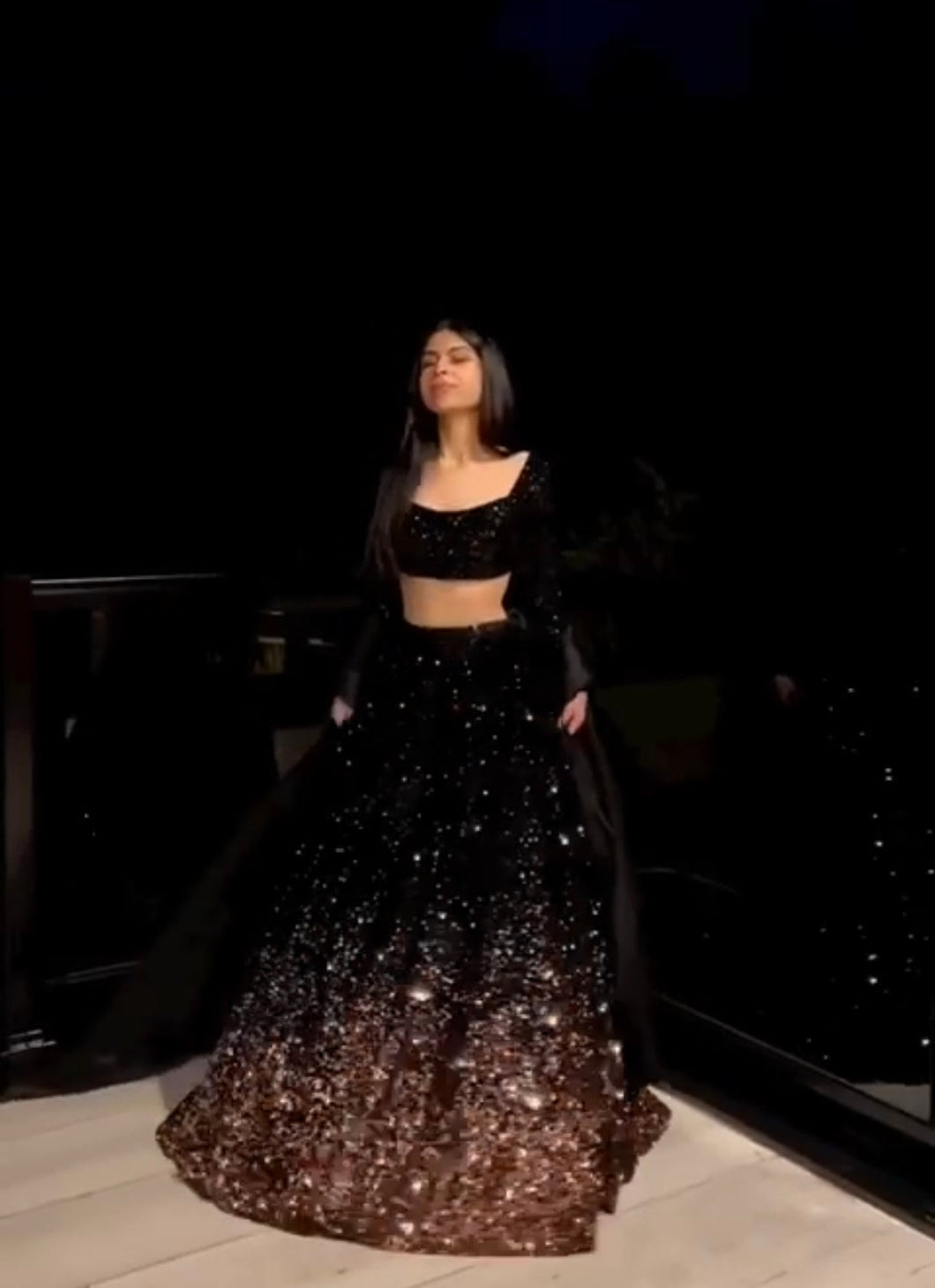 The stunner in Georgette - Black and gold sequins Lehenga