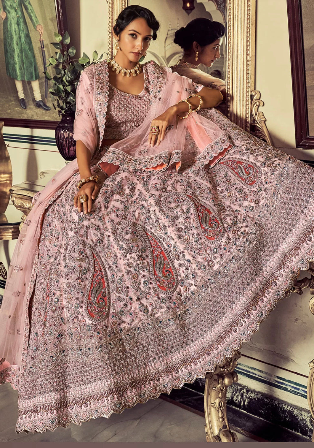 Oreya collection - pink soft net peacock Lehenga