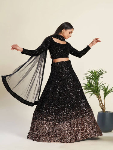 The stunner in Velvet - Black and gold sequins Lehenga