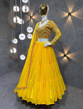 Yellow tiered Lehenga with embroidered blouse