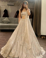 Ivory gold partywear Lehenga