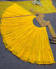 Yellow tiered Lehenga with embroidered blouse