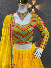 Yellow tiered Lehenga with embroidered blouse