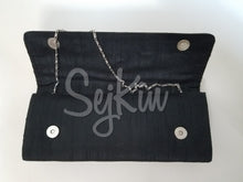 Black long embroidered clutch