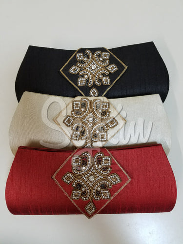 Diamond flap clutch