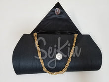 Black triangular flap clutch