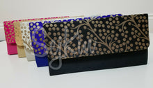 Raw silk clutches