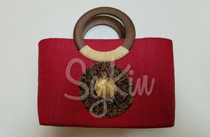 Red wooden handle tote