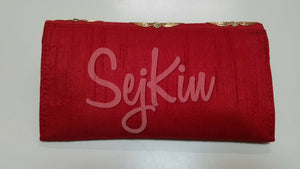 Raw silk motif clutches