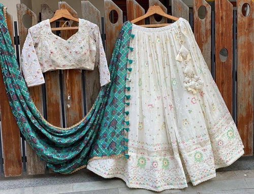 White and colourful threadwork Lehenga