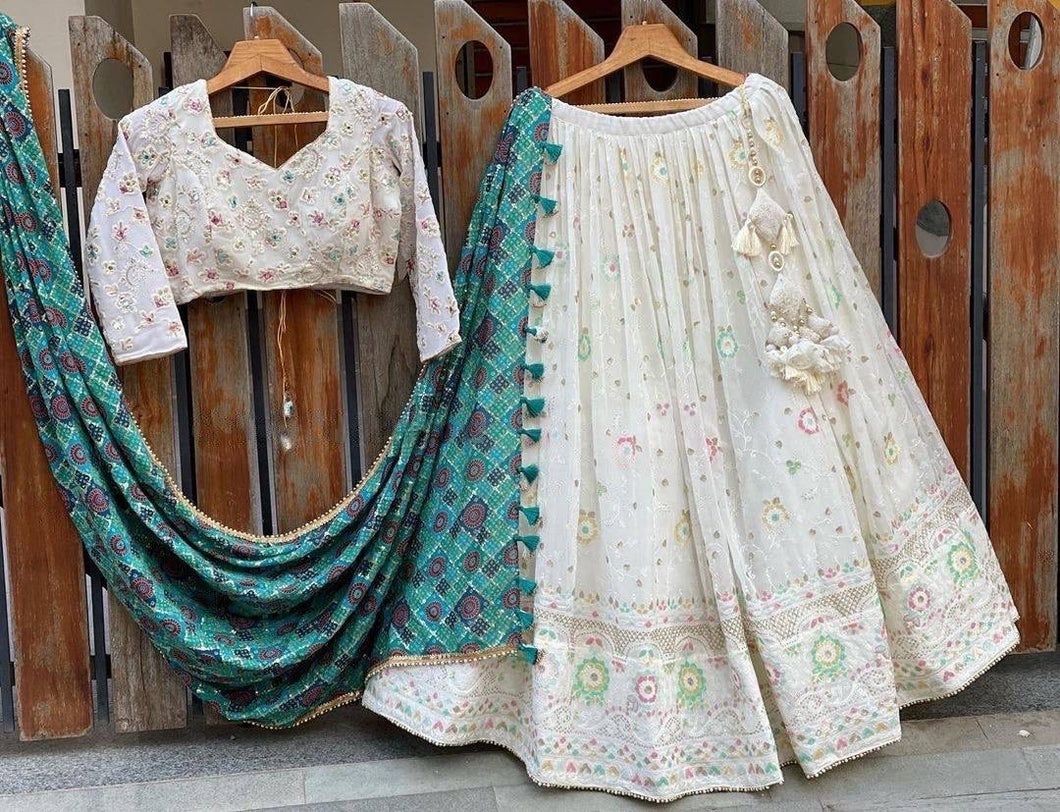 White and colourful threadwork Lehenga