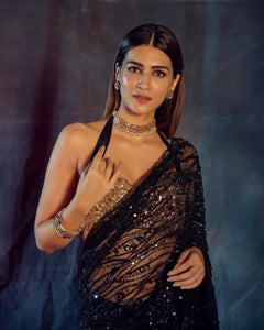 Partywear black net saree with sequins