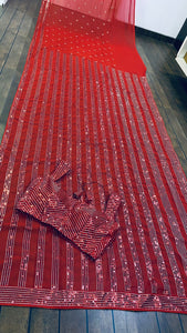 Red saree with sequins
