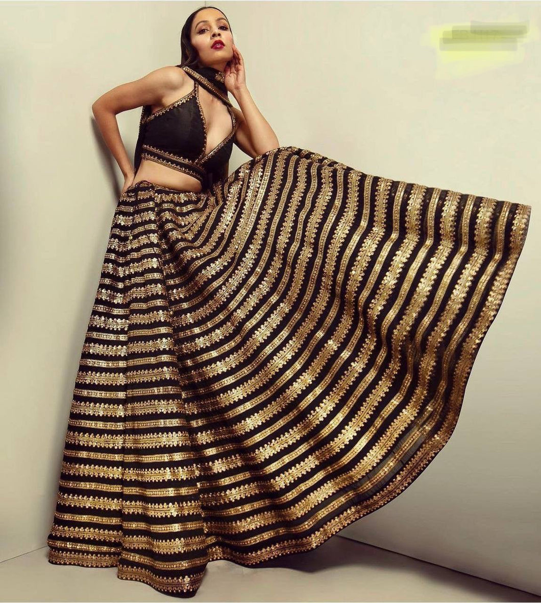 Sabyasachi inspired black and gold Lehenga