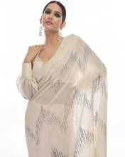 Celebrity inspired saree: white and silver sequinned saree