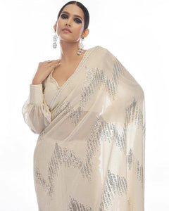 Celebrity inspired saree: white and silver sequinned saree