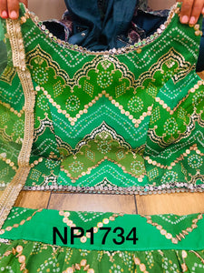 Niks collection - a gorgeous blend of green bandhani lehenga