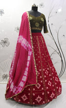 Deep pink and olive green Lehenga
