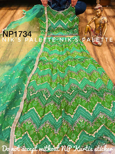 Gorgeous blend of green bandhani lehenga